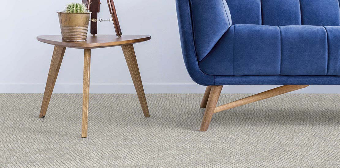 Carpet with royal blue sofa