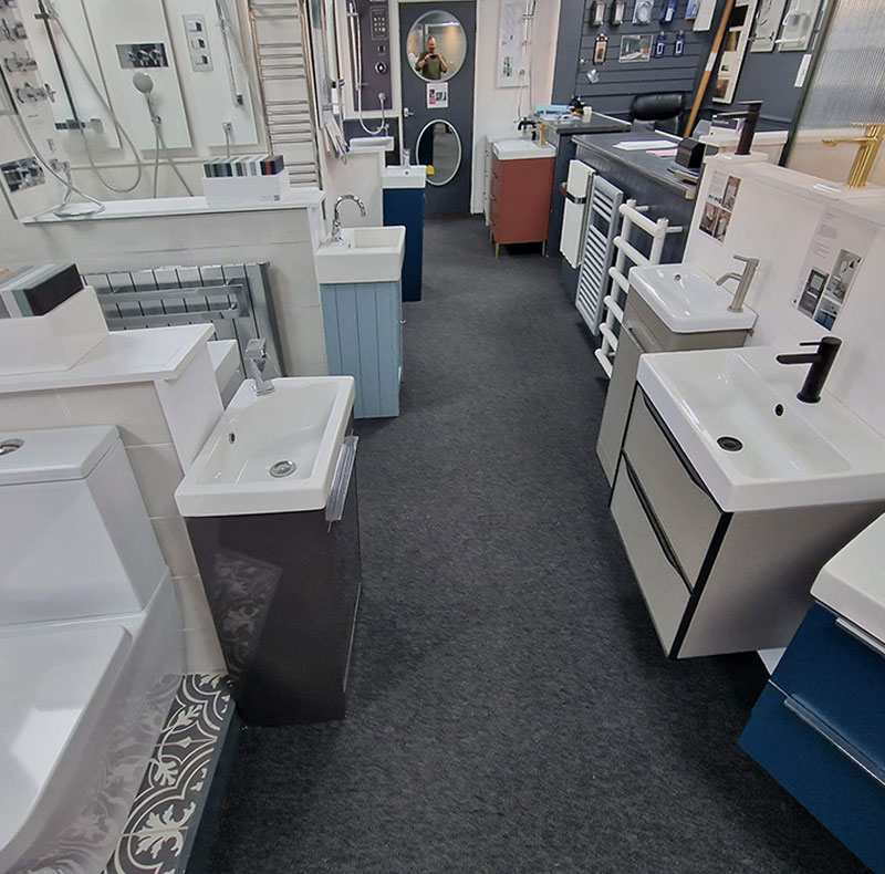 Image Flooring installation of carpet in bathroom showroom