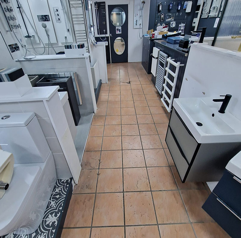 The flooring before Image Flooring installed new carpet