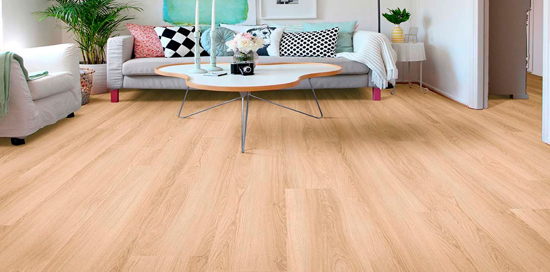 Stylish interior of living room with light pink carpet