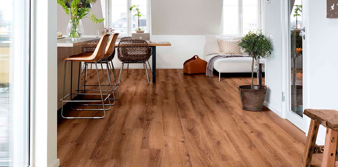 Living area with light grey carpet and sofa