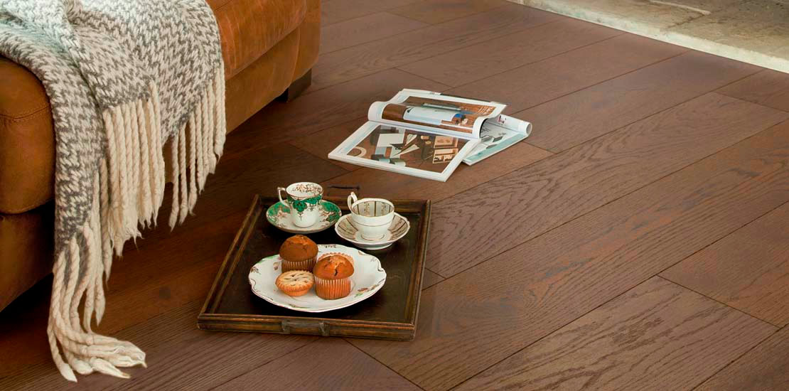 Living area with light grey carpet and sofa
